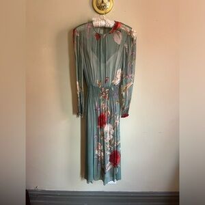 Silk floral dress from Zara. Never worn. Comes with cream colored slip. Size SM
